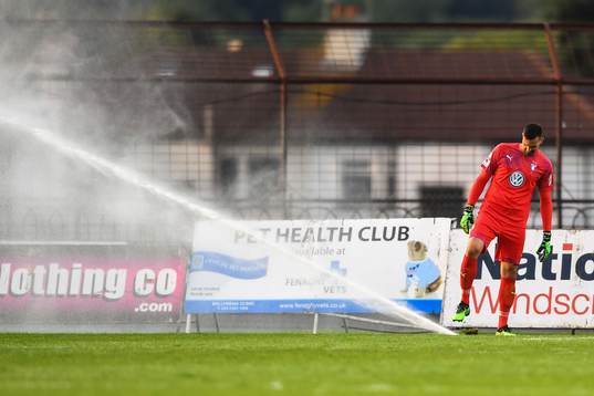 Goalkeeper Dusan Melicharek of Malmö FF when sprinkler