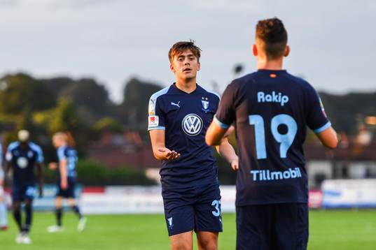 Erdal Rakip and Tim Prica of Malmö FF celebrate