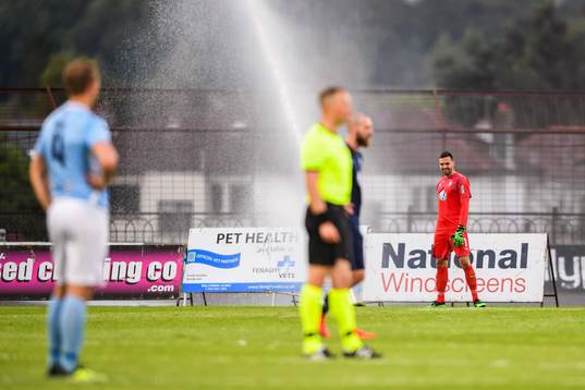 Goalkeeper Dusan Melicharek of Malmö FF when the sprinkler
