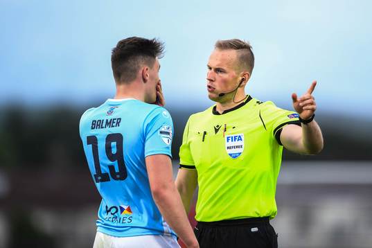 Kofi Balmer of Ballymena United in a discussion with