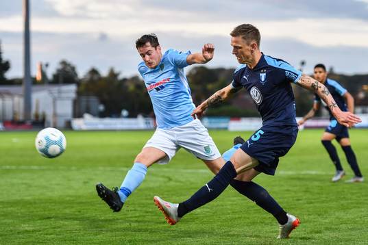 Andy McGrory of Ballymena United and Sören Rieks of Malmö