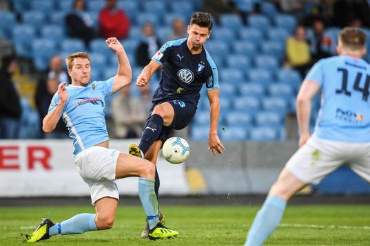 Jonathan Addis of Ballymena United and Marcus Antonsson of