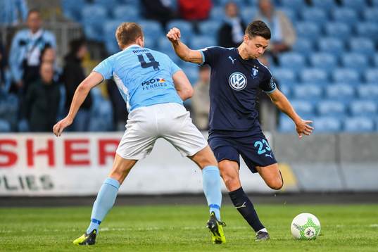 Jonathan Addis of Ballymena United and Marcus Antonsson of
