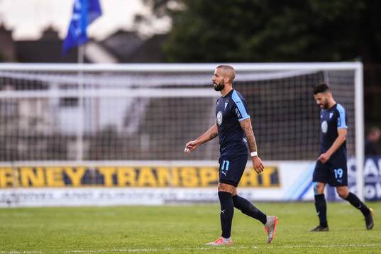 Guillermo Molins and Erdal Rakip of Malmö FF look dejected