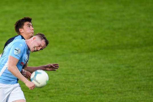 Tim Prica of Malmö FF and Andrew Burns of Ballymena United
