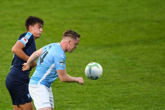 Tim Prica of Malmö FF and Andrew Burns of Ballymena United