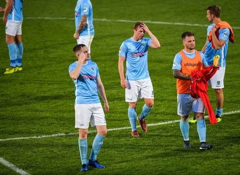 Players of Ballymena United look dejected