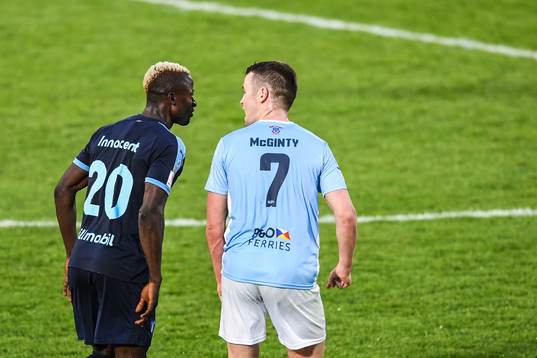 Bonke Innocent of Malmö FF in a discussion with Shane
