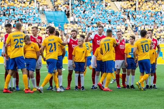 The players greet each other