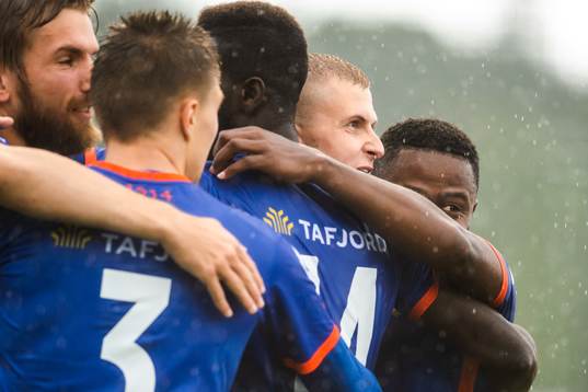 David Kristjan Olafsson of Aalesund celebrate with teammates