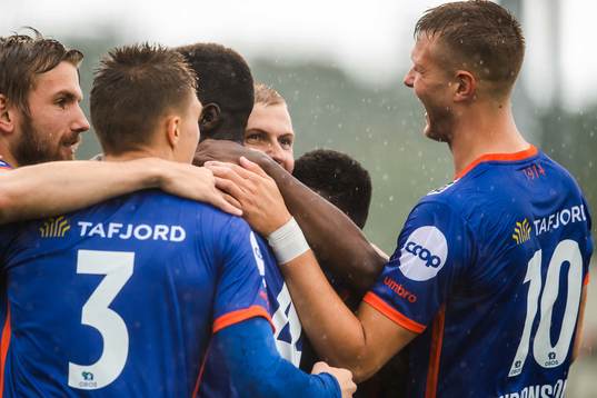 David Kristjan Olafsson of Aalesund celebrate with teammates