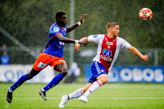 Pape Habib Gueye of Aalesund and Tobias Collett of KFUM