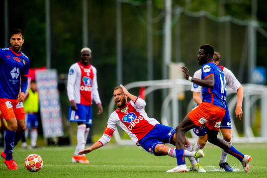 Stian Sortevik of KFUM and Pape Habib Gueye of Aalesund