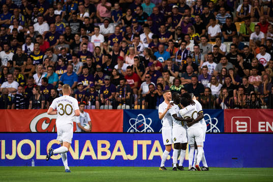 Henok Goitom of AIK celebrate with team mates
