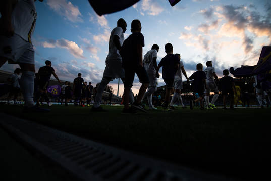Players of AIK enter the pitch