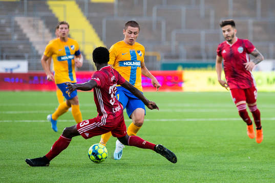 Seydina Keita of Liepaja defends against Simon Thern of IFK