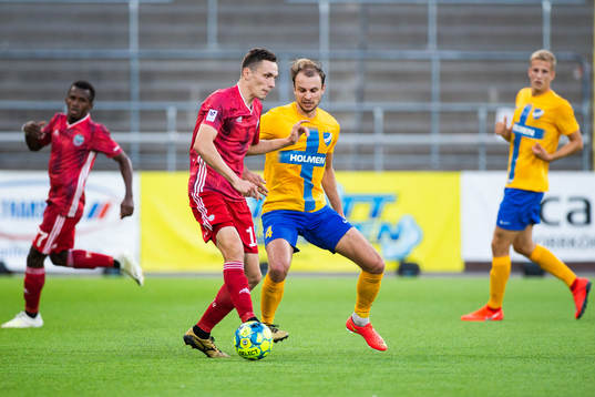 Raivis Jurkovskis of Liepaja and Lars Krogh Gerson of IFK