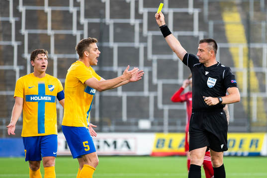Christoffer Nyman of IFK Norrköping receives a yellow card