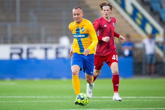 Gudmundur Thórarinsson of IFK Norrköping and Mārtiņš