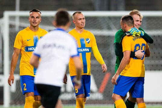 Goalkeeper Isak Pettersson and Sead Haksabanovic of IFK