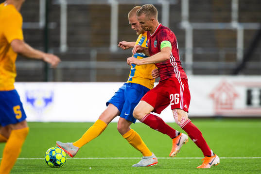 Kalle Holmberg of IFK Norrköping and Deniss Ivanovs of