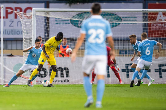 Behrang Safari of Malmö FF defends against Shamar