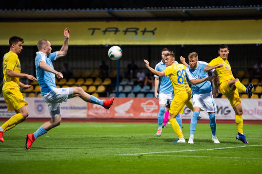 Jo Inge Berget reaches for the ball while Rasmus Bengtsson