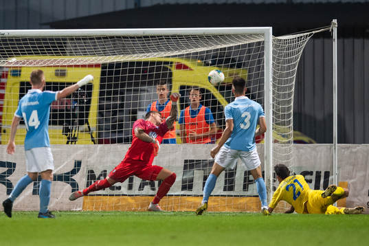 goalkeeper Johan Dahlin of Malmö FF saves an attempt from