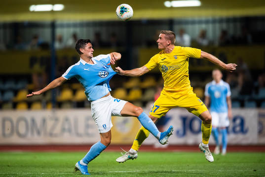 Marcus Antonsson of Malmö FF andGaber Dobrovoljc of Domzale