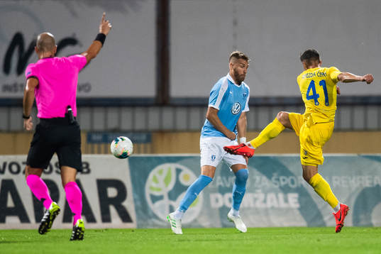 Rasmus Bengtsson of Malmö FF and Adam Gnezda of Domzale