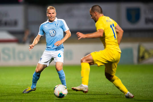 Oscar Lewicki of Malmö FF and Tonic Mujan of Domzale