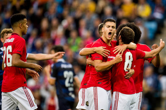 Diogo Dalot of Manchester United celebrates with teammates