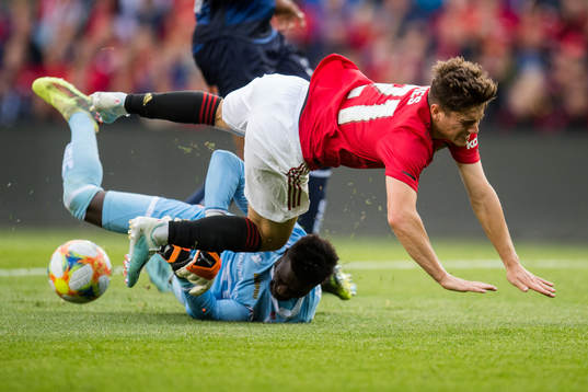 Goalkeeper Serigne Mbaye of Kristiansund and Daniel James