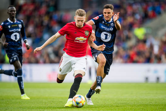 Scott McTominay of Manchester United and Haris Cirak of