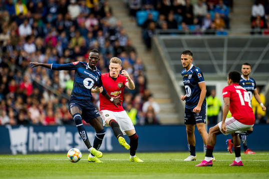 Amidou Diop of Kristiansund and Scott McTominay of