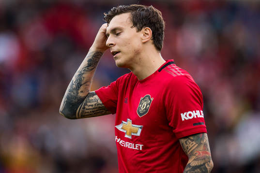 Victor Lindelöf of Manchester United looks dejected
