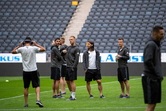 Players of Maribor inspecting the pitch