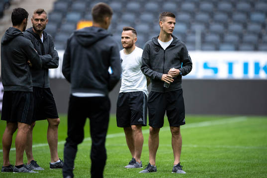 Players of Maribor inspecting the pitch