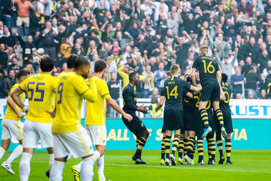 Per Karlsson of AIK celebrates with teammates