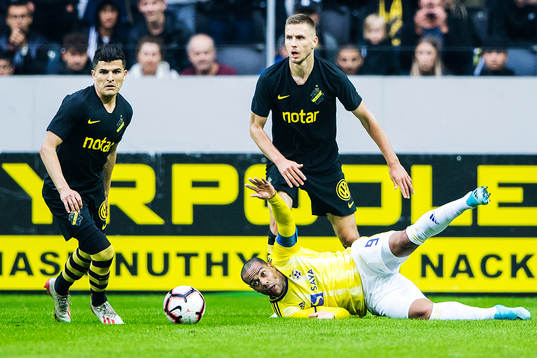 Karol Mets and Tarik Elyounoussi of AIK and Marcos Tavares