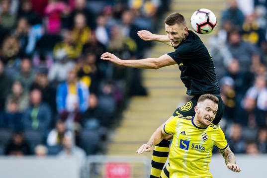 Karol Mets of AIK and Dino Hotic  of Maribor