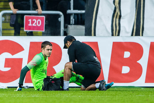 Goalkeeper Oscar Linnér of AIK with a possible injury