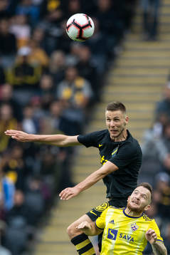 Karol Mets of AIK and Dino Hotic of Maribor