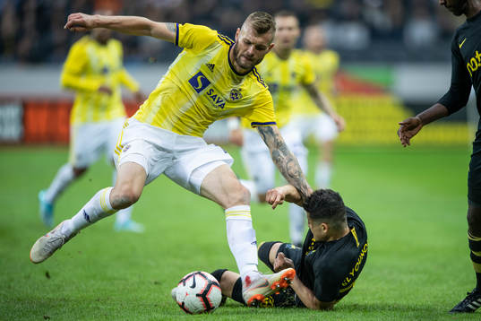 Alexandru Cretu of Maribor and Tarik Elyounoussi of AIK