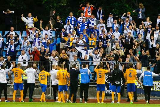 Players of IFK Norrköping celebrate with supporters