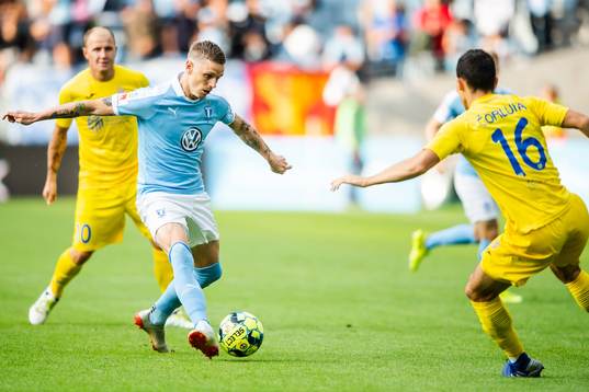 Sören Rieks of Malmö FF and Josip Corluka of Domzale