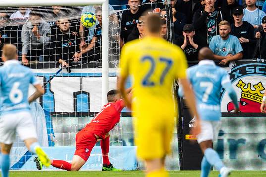 Shamar Nicholson of Domzale scores 0-1 behind goalkeeper