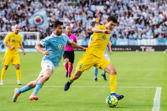 Behrang Safari of Malmö FF and Josip Corluka of Domzale
