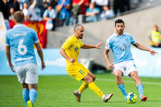 Tonic Mujan of Domzale and Behrang Safari of Malmö FF