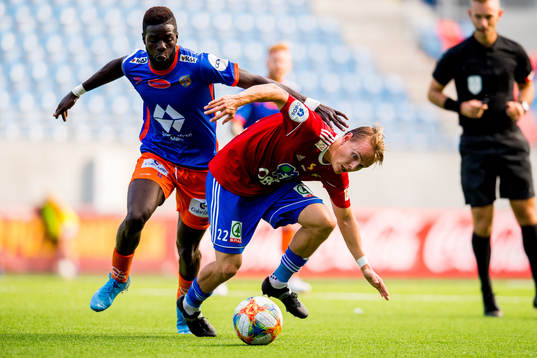 Pape Habib Gueye of Aalesund and Henning Tønsberg Andresen